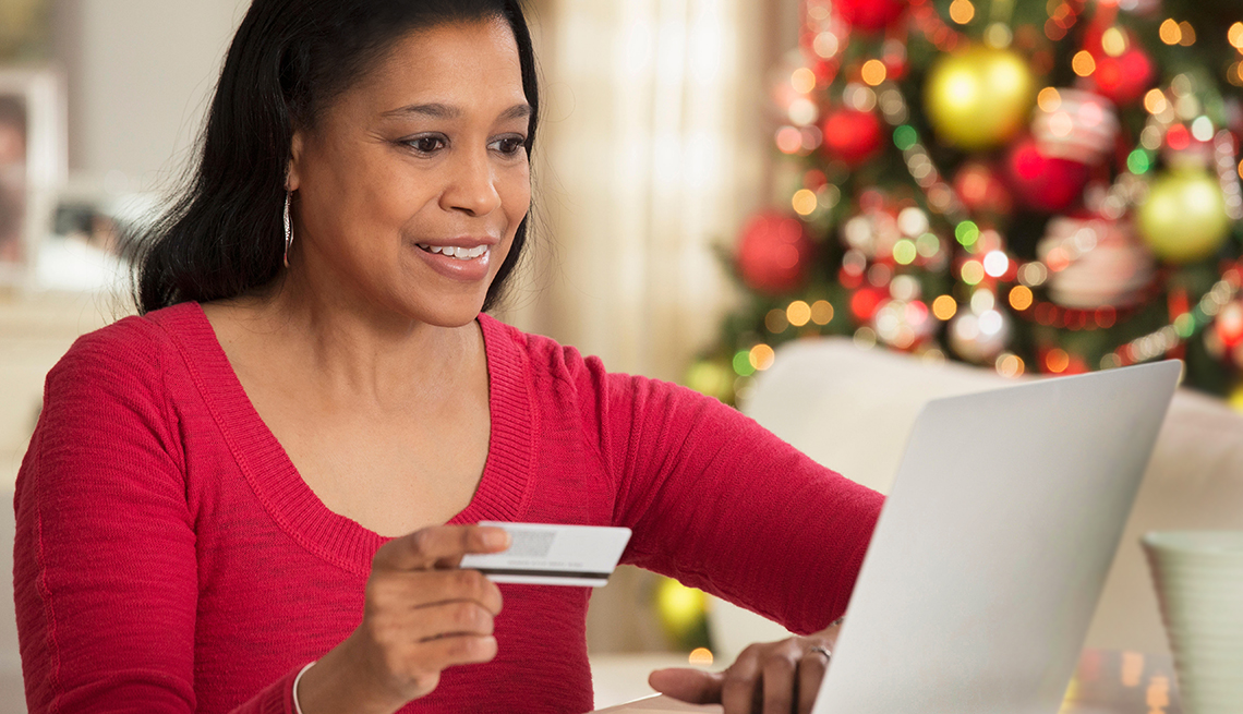 Woman shopping online at home, Stay Safe Online This Holiday Season 