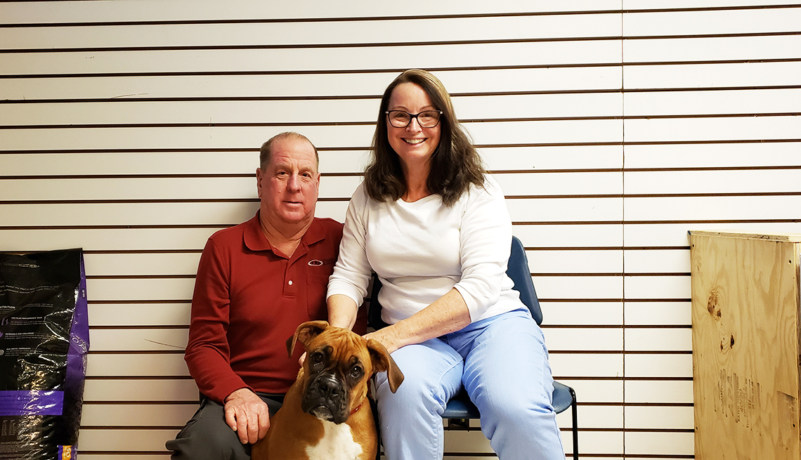 Karen and Joe Heyden and dog Heidi, purchased after the couple was scammed.