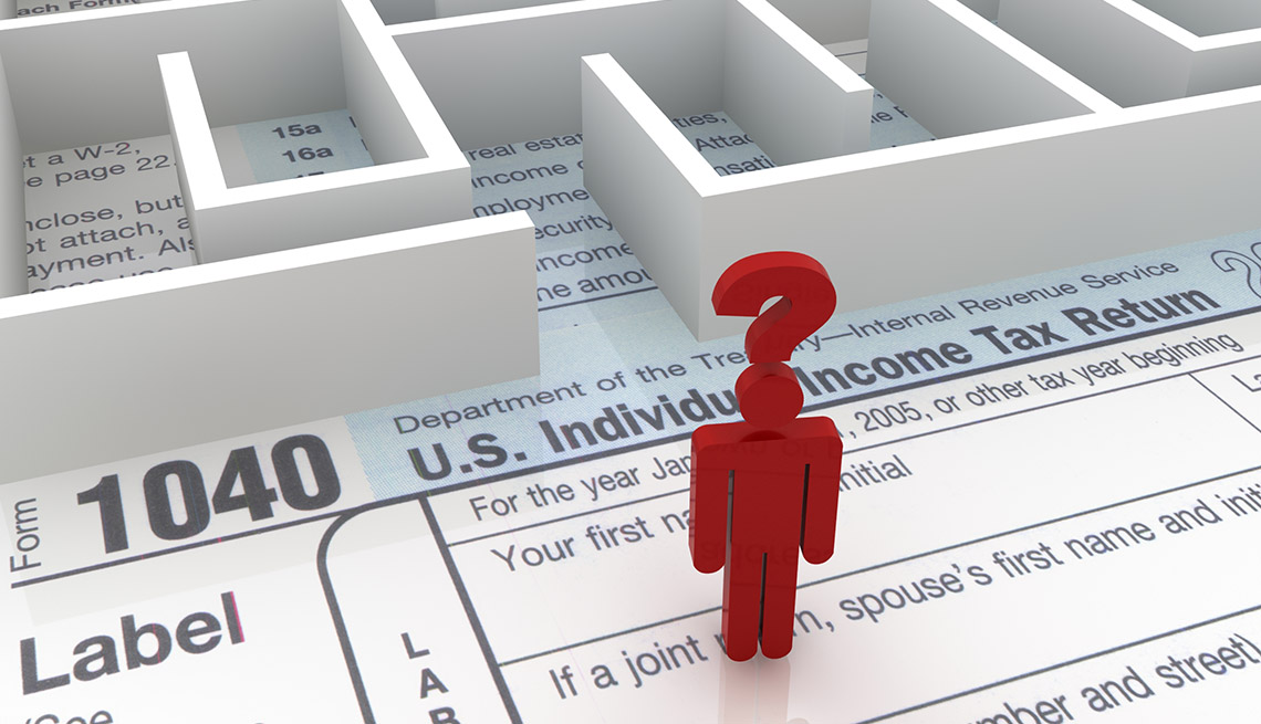a red stick figure with a big question mark stands on a 1040 tax form facing a labryinth