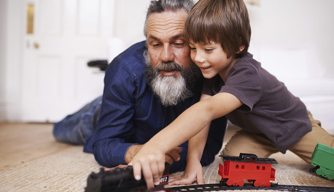 Grandfather and Grandson playing with a train set, Jenkins: Future of Social Security and Medicare