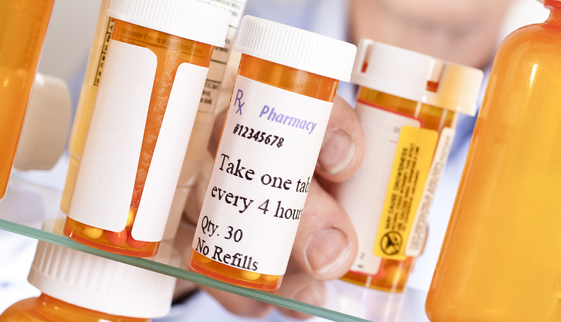 Pill bottles in a medicine cabinet