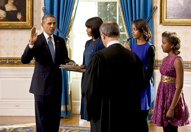 Supreme Court Chief Justice John Roberts administers the oath of office to President Barack Obama during the official swearing-in ceremony in the Blue Room of the White House on Inauguration Day, Sunday, Jan. 20, 2013. (The White House)