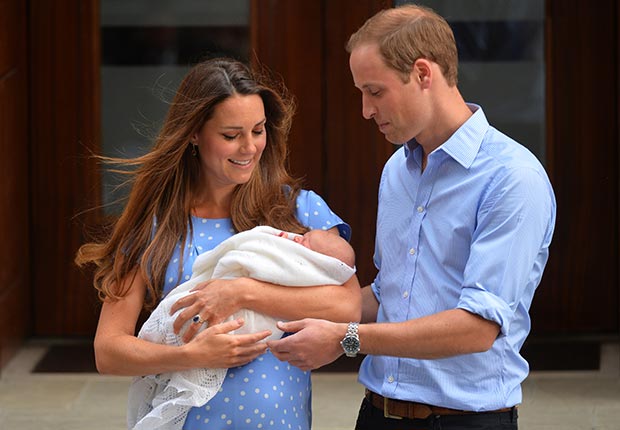 Prince William and Catherine, Duchess of Cambridge, show their new-born baby boy Prince George to the world's media outside the Lindo Wing of St Mary's Hospital in London (AFP/Getty Images)