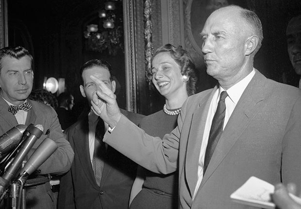Senator Strom Thurmond is mobbed by reporters as he steps from the Senate Chamber after ending his 24-hour, 18-minutes talkathon against the Civil Rights Bill, Golden Jubilee of the 1964 Civil Rights Act
