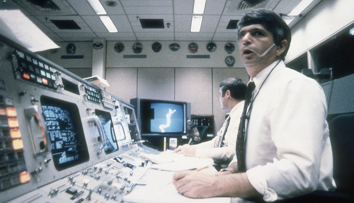 Frederick Gregory and Richard O. Covey, spacecraft communicators at Mission Control in Houston, watch helplessly as the shuttle Challenger explodes on Jan. 28, 1986.
