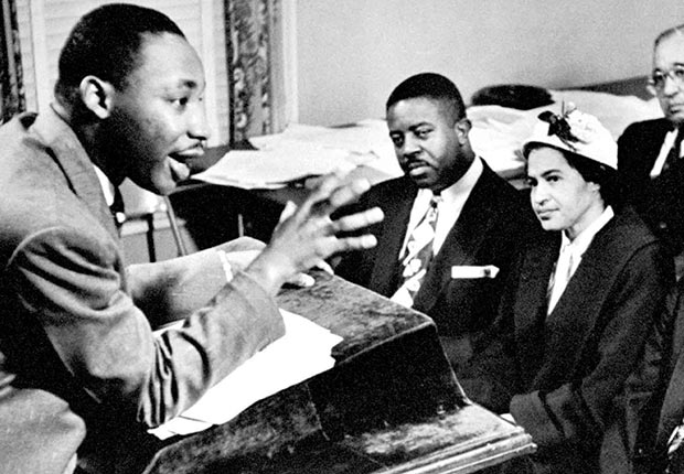 Rev. Martin Luther King outlines boycott strategies to his advisers & organizers incl. (seated L-R) Rev. Ralph Abernathy & Rosa Parks who was the catalyst for the protest of bus riders   