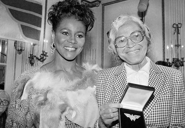 Civil Rights activist Rosa Parks, (R), of Detroit shows off the Wonder Woman Foundation's special 1984 Eleanor Roosevelt Woman of Courage Award presented to her on November 14, 1984. At left is actress Cicely Tyson who presented the award. Parks was honored for her work in the Civil Rights movement.