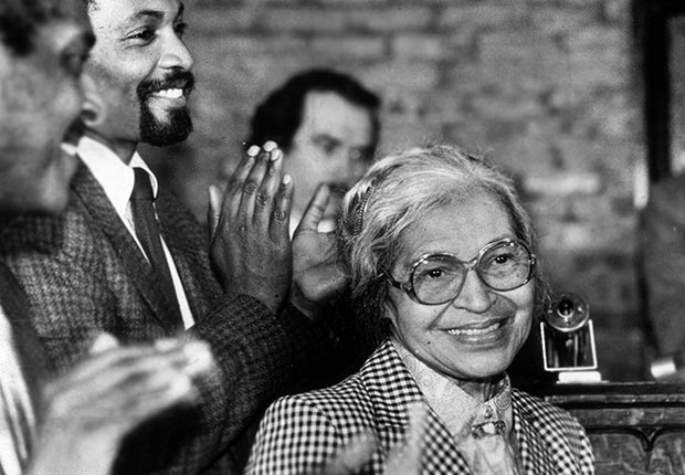 Civil rights leader Rosa Parks smiles while people gathered around her applaud at a ceremony held in her honor at the House of the Lord Church, Brooklyn, New York.