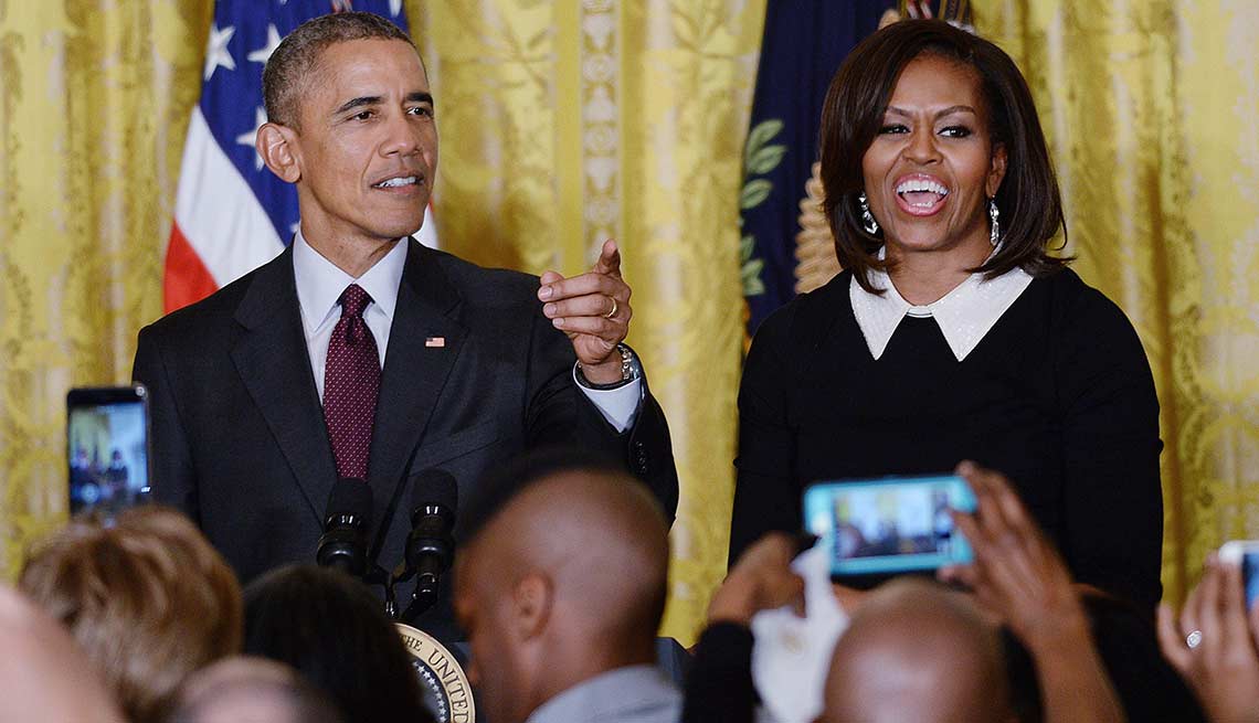 President Barack Obama (L) and First Lady Michelle Obama host a reception celebrating African American History Month 
