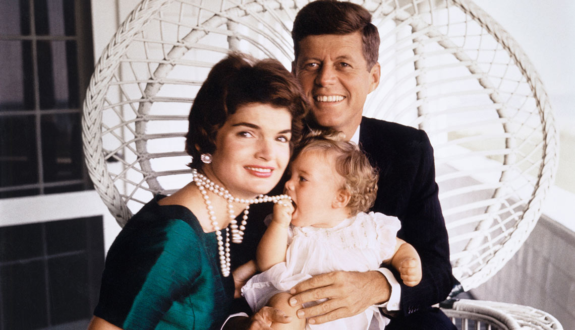 John F. and Jaqueline Kennedy with daughter Caroline age 9 months