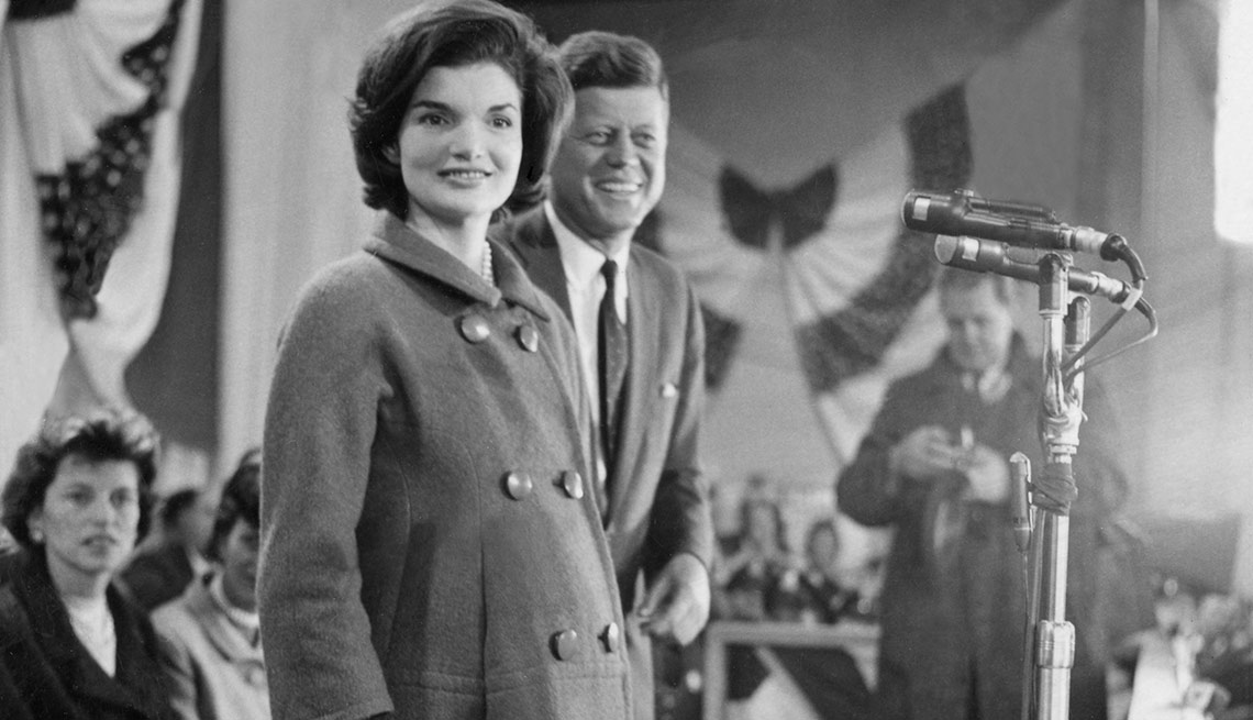 Massachusetts, USA, 9th November, 1960, Democrat President-elect of the United States of America John F, Kennedy smiles watched by his wife Jacqueline before speaking at Hyannis port Armory on the day his election victory was announced