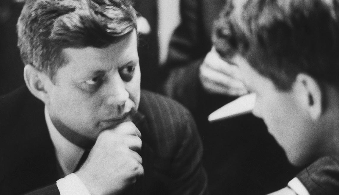 Back at campaign headquarters, Kennedy confers with his younger brother Robert, who he would later make his U.S. attorney general.
