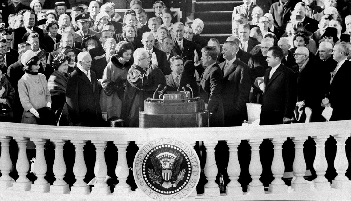 Among those visible nearby on Jan. 21, 1961, as Earl Warren, chief justice of the United States, administers the oath of office to JFK: Jacqueline Kennedy, former President Dwight D. Eisenhower, Vice President Lyndon B. Johnson and former Vice President Richard Nixon. 