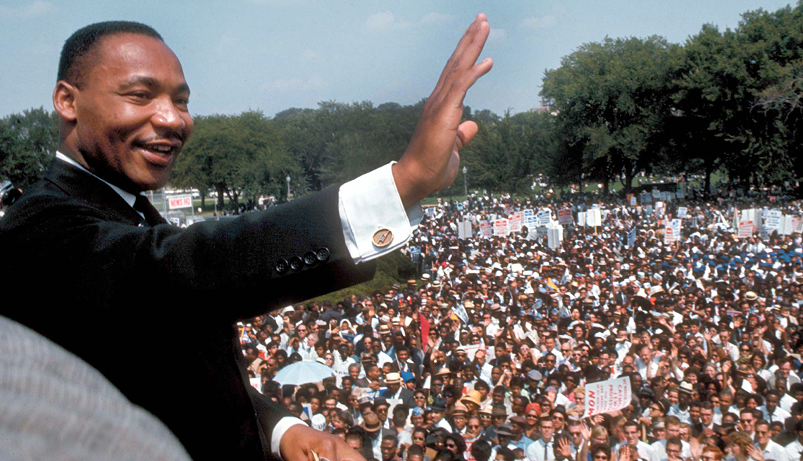 Martin Luther King Junior, March On Washington, Martin Luther King Junior Waves To The Massive Crowd Of Participants In THe March On Washington, DC, Civil Rights, 1963 Was a Year With Lasting Impact, AARP Politics, Events And History