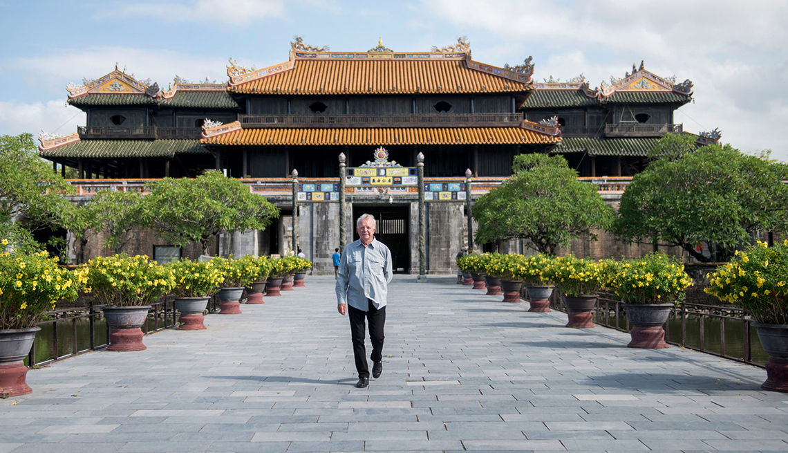 item 6 of Gallery image - Ray Wilkinson walks inside the Imperial Citadel in Hue. This was a battle site during the Tet Offensive in the Vietnam War.