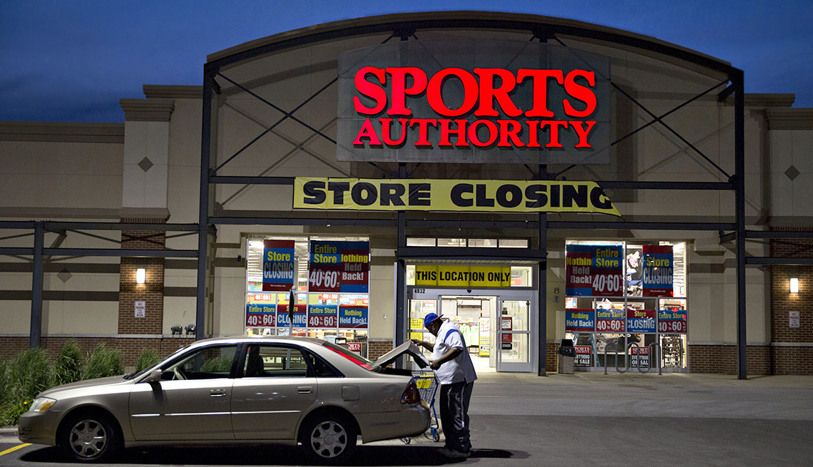 item 2 of Gallery image - Sports Authority store at night 