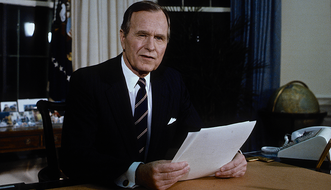 President George H.W. Bush in Oval office.