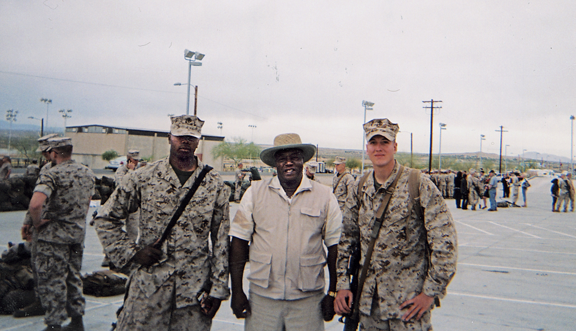 From left: Larry II, Larry Sr. and friend Garrett W. Bush on deployment day in 2011