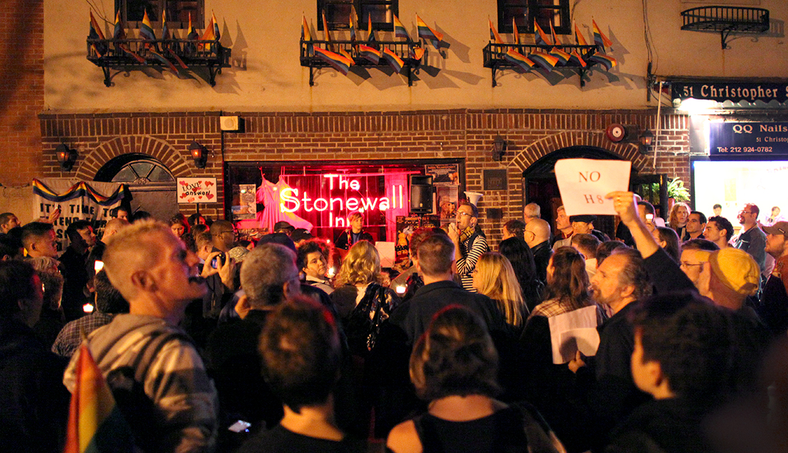 People participate at a rally outside the Stonewall Inn