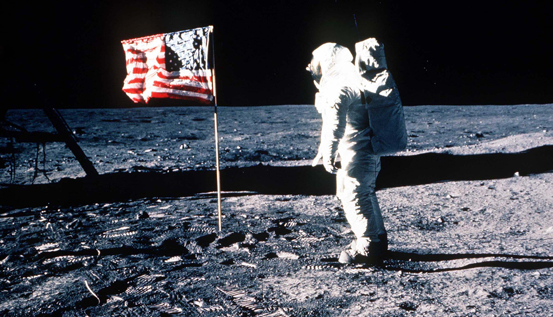 Buzz Aldrin saluting the American flag on the moon