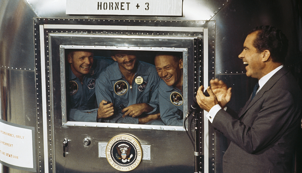 item 8 of Gallery image - Apollo eleven astronauts in quarantine talking with President Richard Nixon