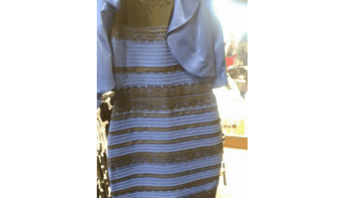item 8 of Gallery image - a snapshot of a blue and black lace dress taken in poor lighting conditions in a store