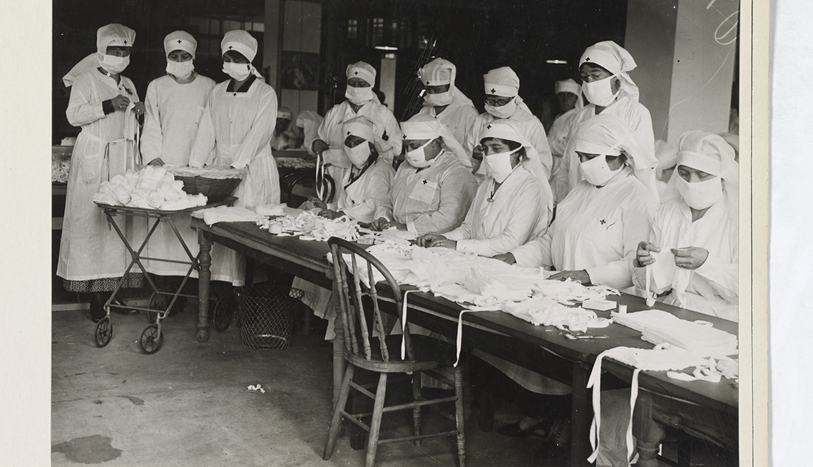 item 5 of Gallery image - historical photo of nurses making gauze bandage masks