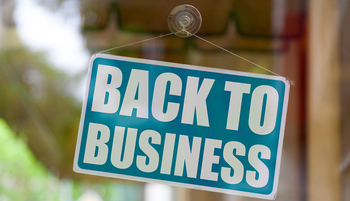 item 4 of Gallery image - store window sign saying back to business