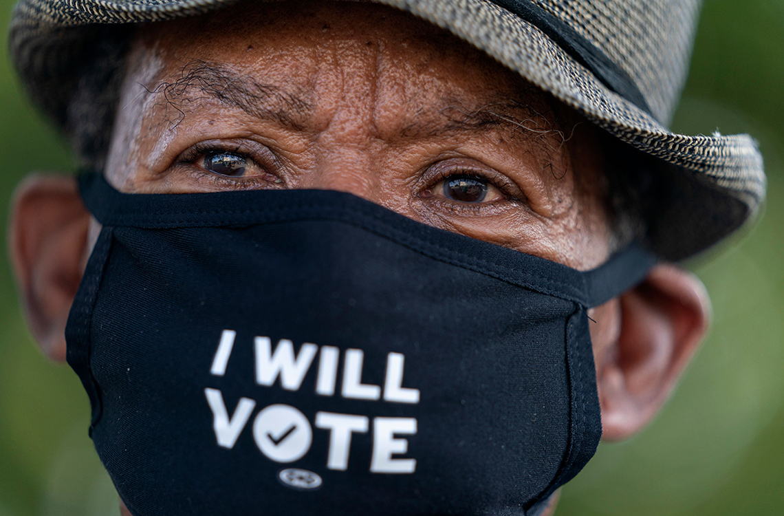 item 15 of Gallery image - A man wearing a hat and mask with the words I will vote on it