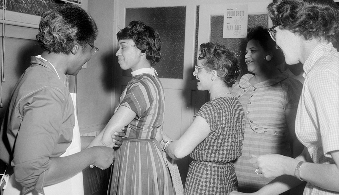 item 9 of Gallery image - young women in line for a polio vaccine in this image from the nineteen fifties