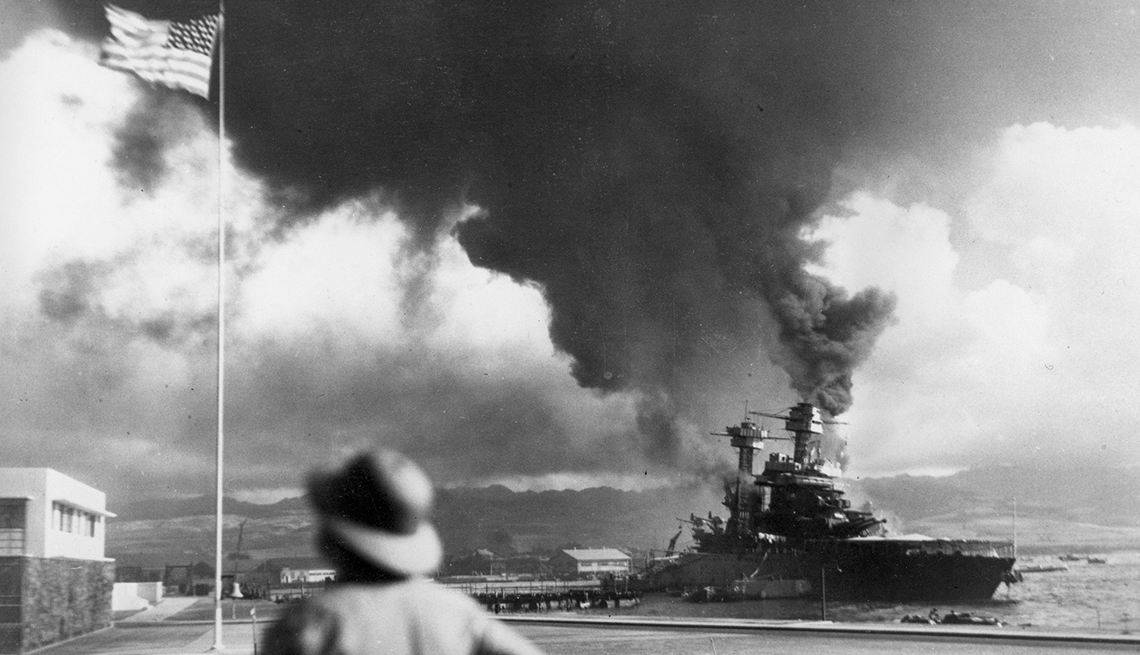 nineteen forty one photo taken at pearl harbor with an american ship burning from the attack