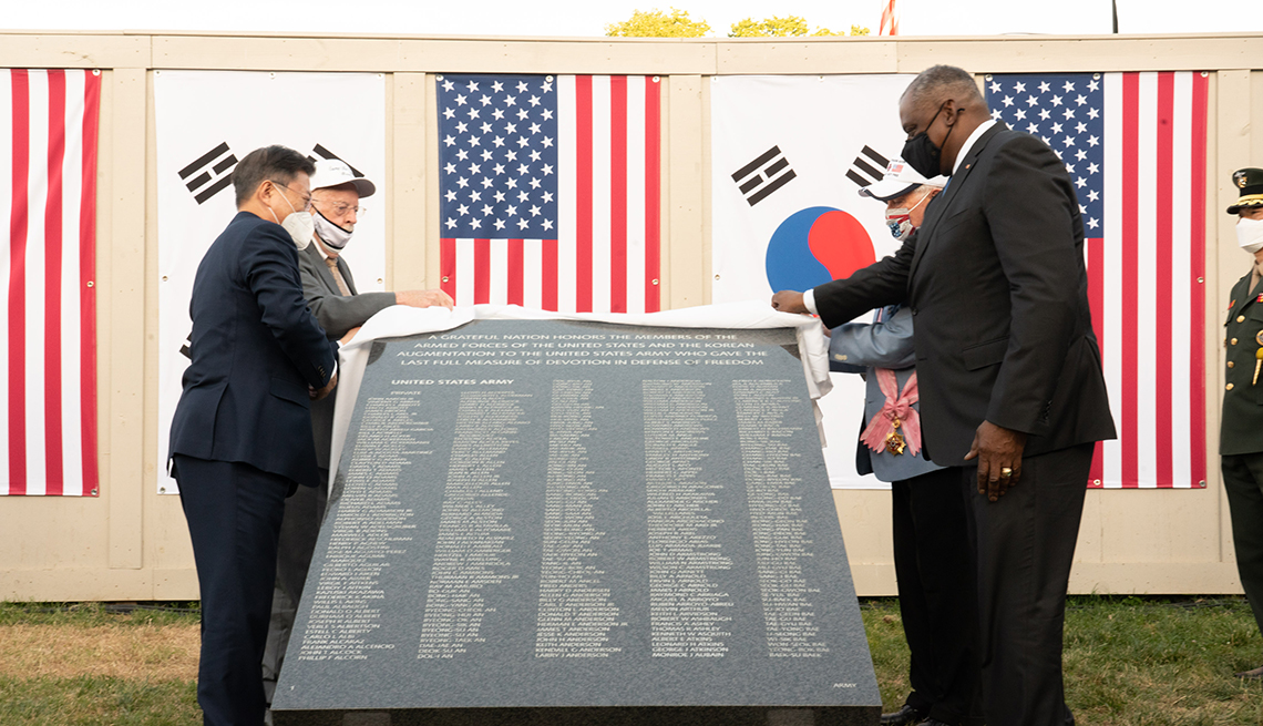 item 1 of Gallery image - secretary of defense lloyd austin korean president moon jae in korean ambassador to the u s lee soo hyuc and other participants at the groundbreaking ceremony for the korean war veterans memorial unveiling a piece of the remembrance wall