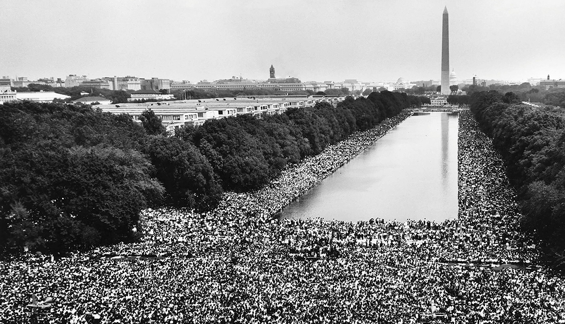 Civil Rights March on Washington, D.C in August 1963.  View of marchers along the mall, showing the Reflecting Pool and the Washington Monument.