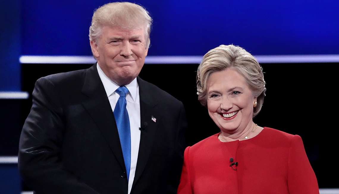 Democratic presidential nominee Hillary Clinton takes the stage with Republican presidential nominee Donald Trump during the first Presidential Debate