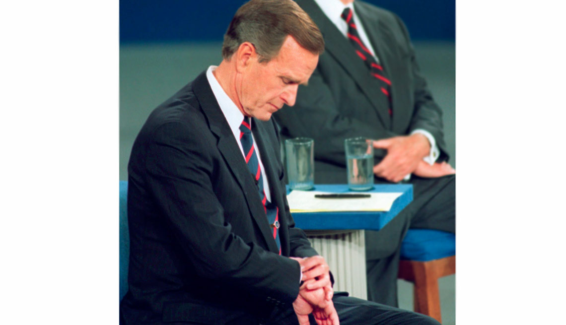 10 Weird things that happened during presidential campaigns - President George H.W. Bush looks at his watch 
