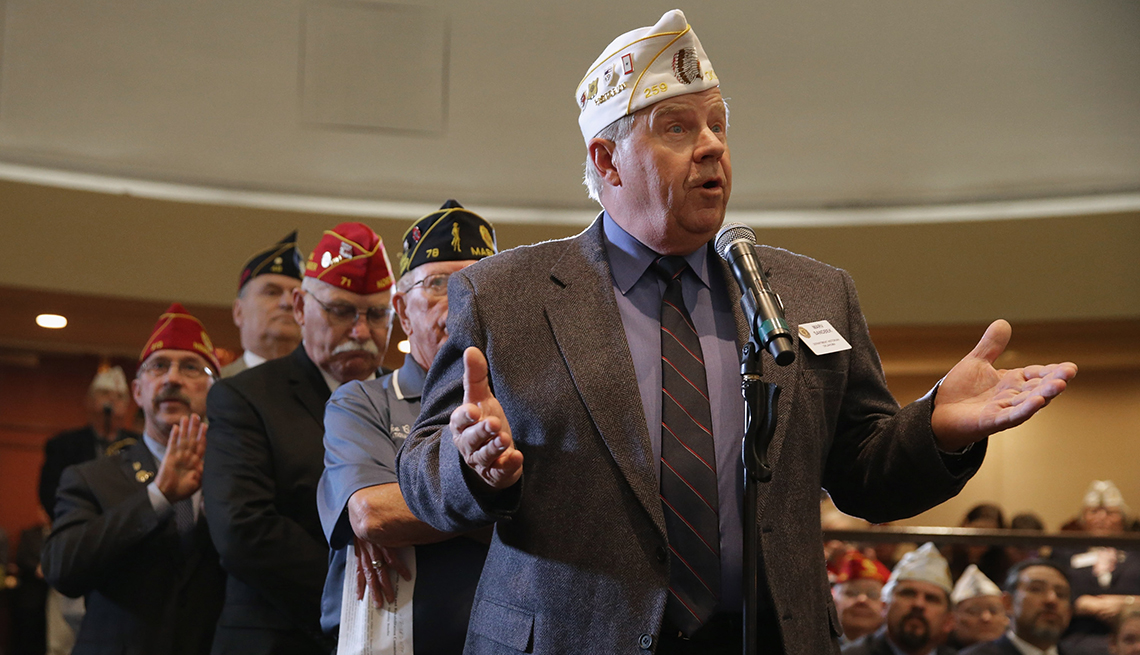 Veterans line up to ask questions at an American Legion conference.