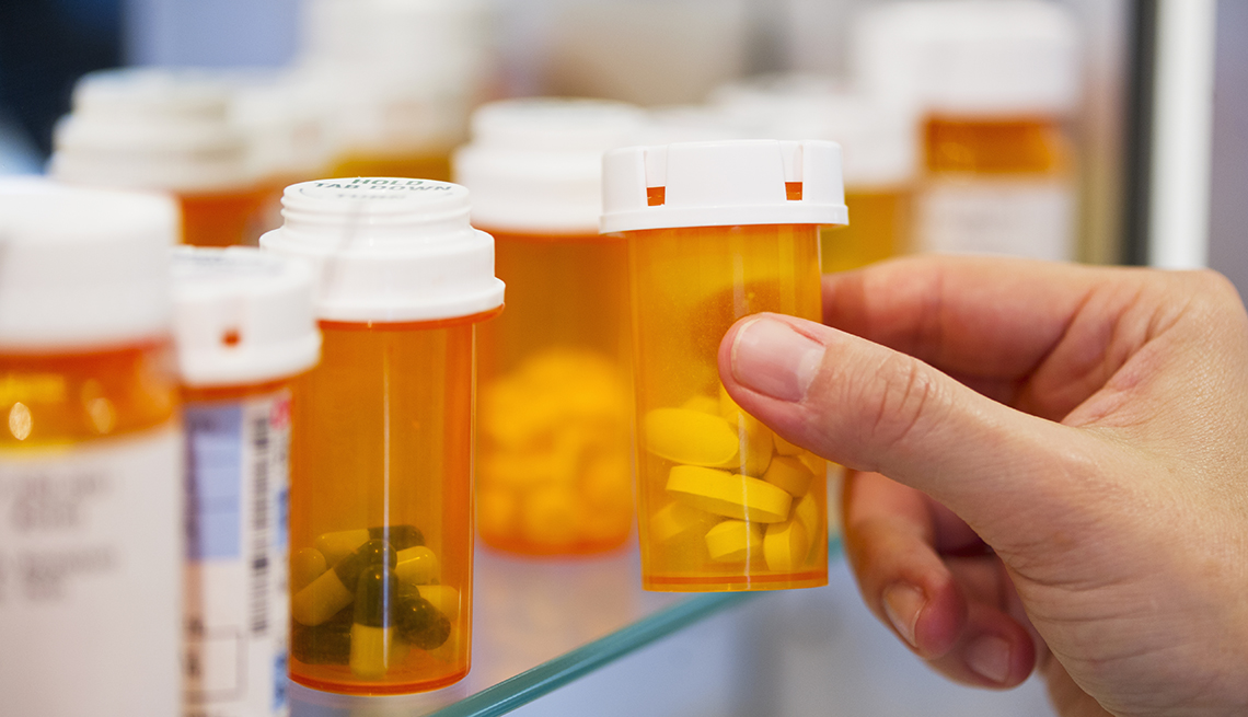 Pill bottles in a medicine cabinet