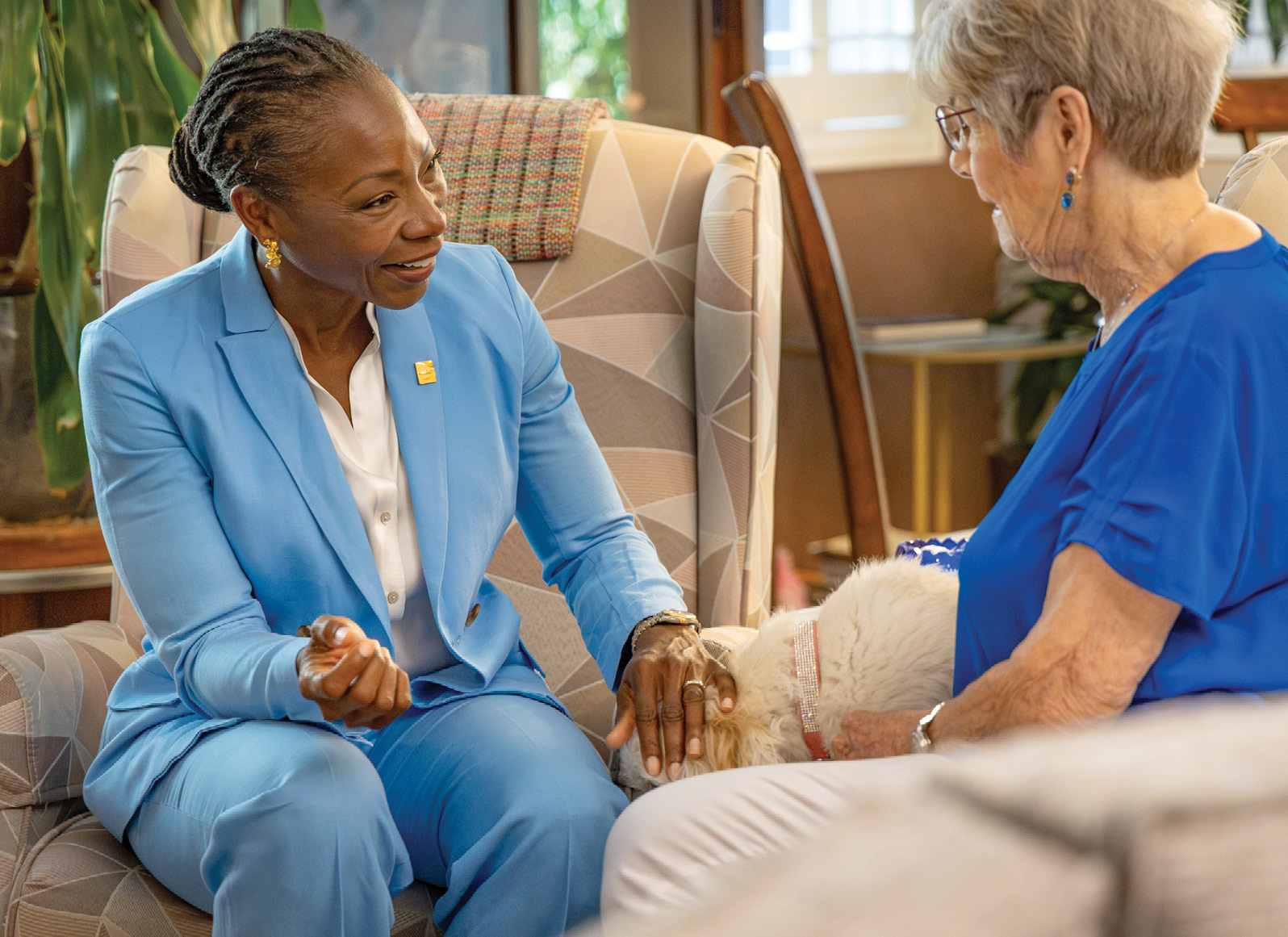 Photograph of Myechia discussing social security with Marylyn Jones in her Las Vegas home.