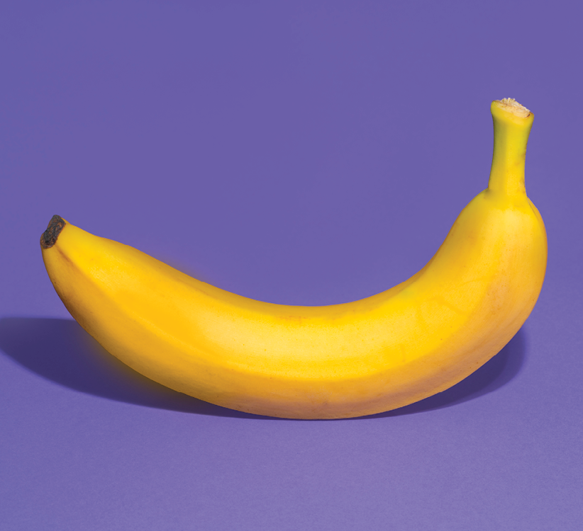 Banana against a purple background
