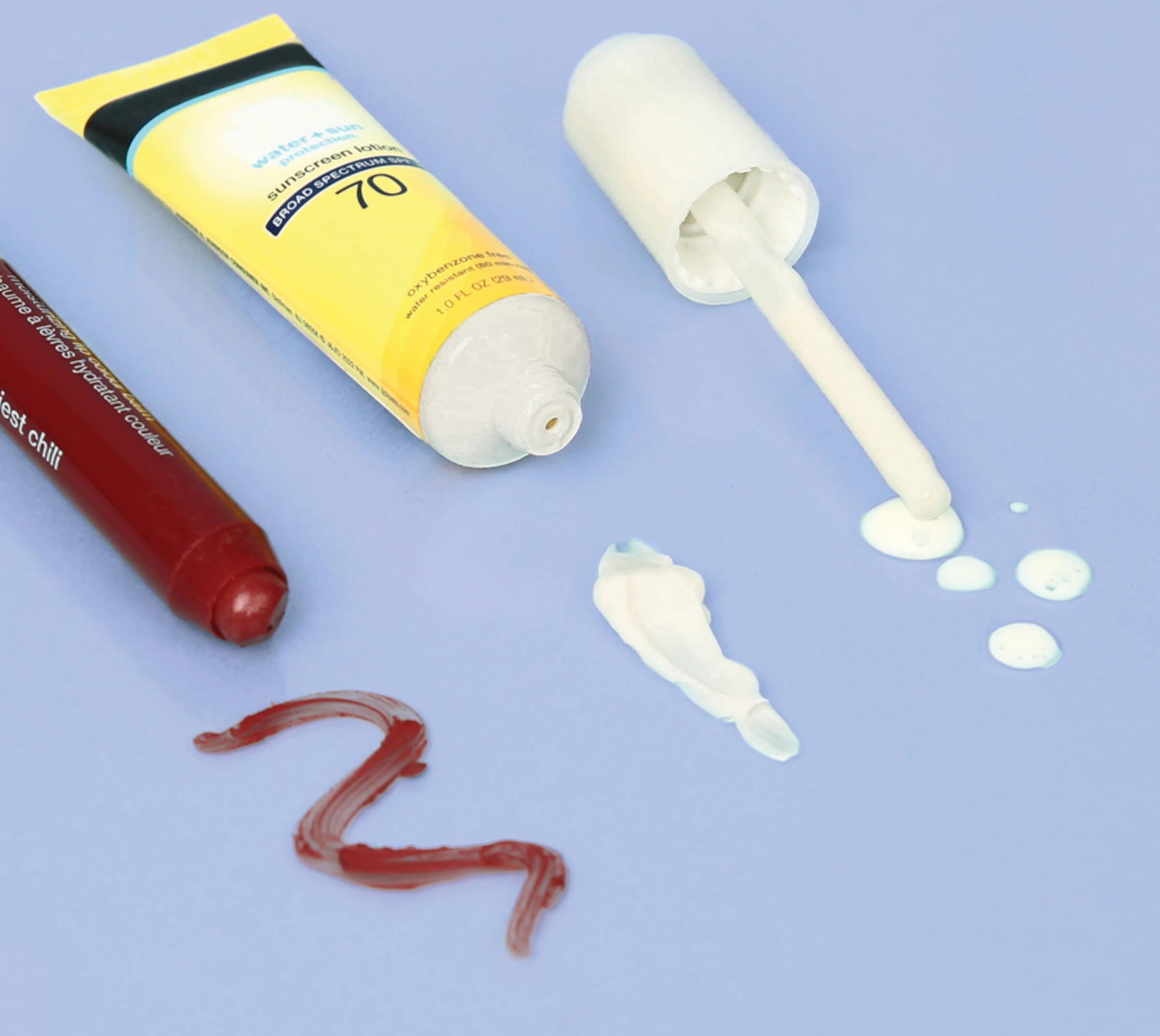 3 open skincare products with a small quantity of each dispensed.