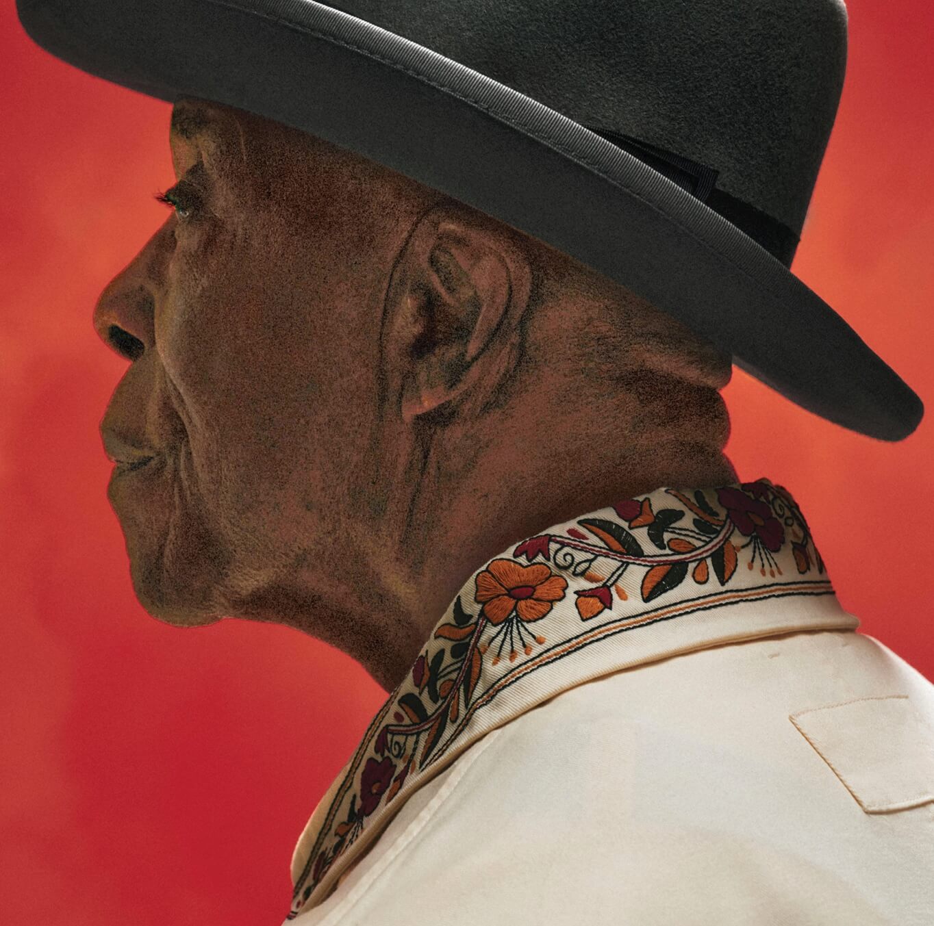 Side profile of Buddy Guy wearing a black hat