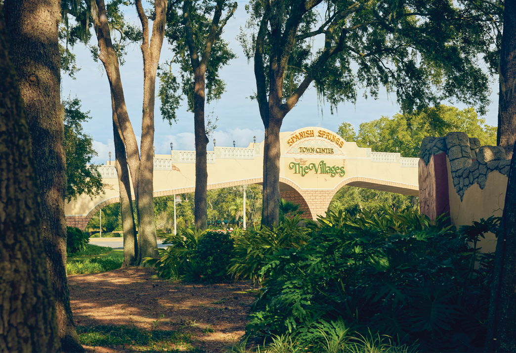 Photograph of a retirement community surrounded by trees and greenery&nbsp;