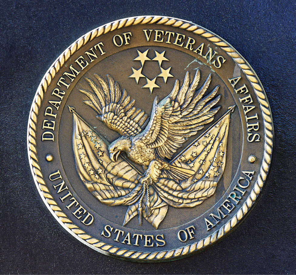 Photo of Department of Veterans Affairs seal on side of building