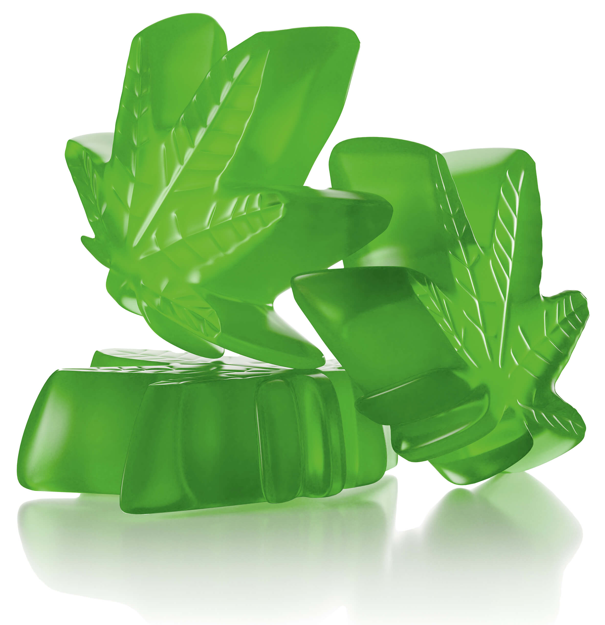 Photo of three stacked green gummies in the shape of marijuana leaves