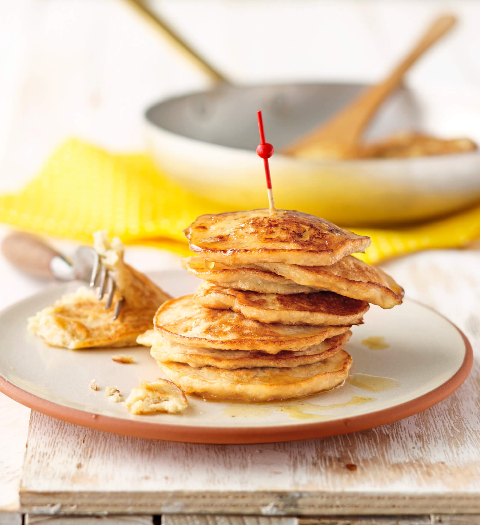 Photo of a stack of banana pancakes on a plate