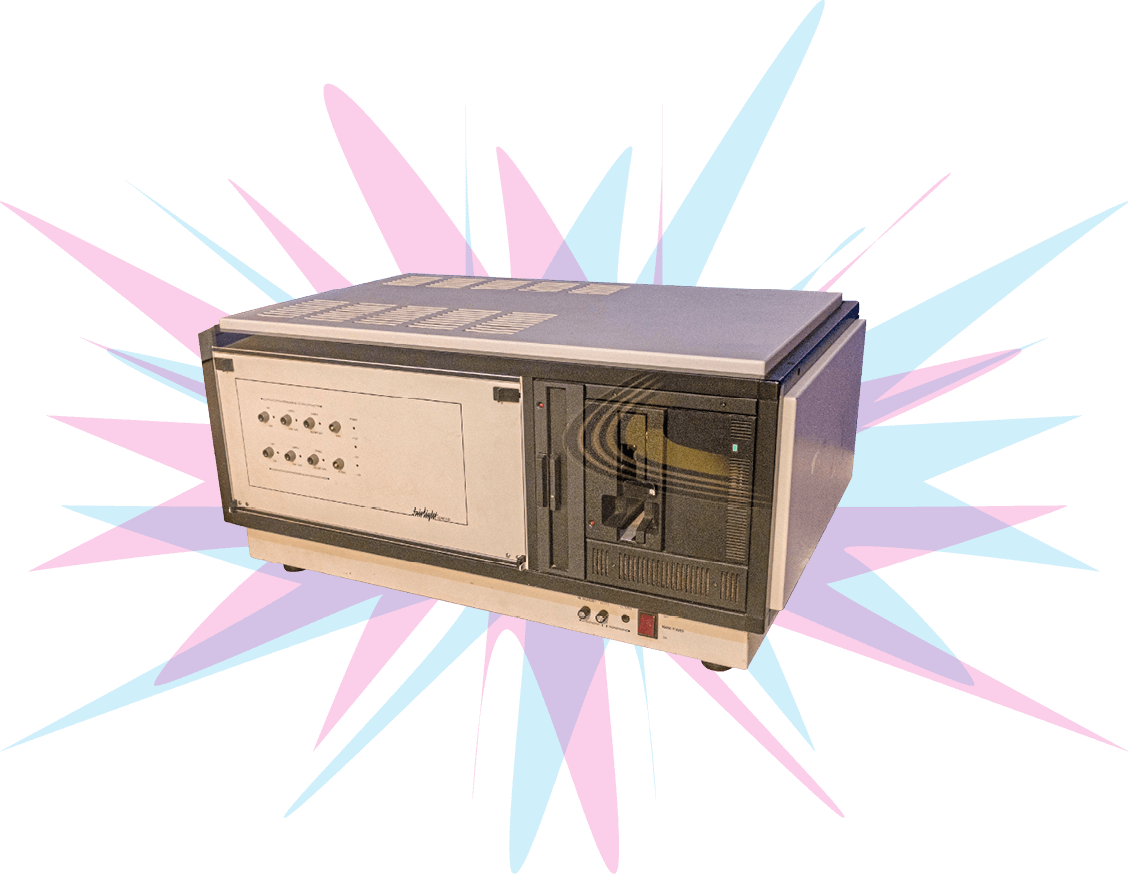 Photo of the Fairlight Computer Music Instrument on a pink and blue burst background