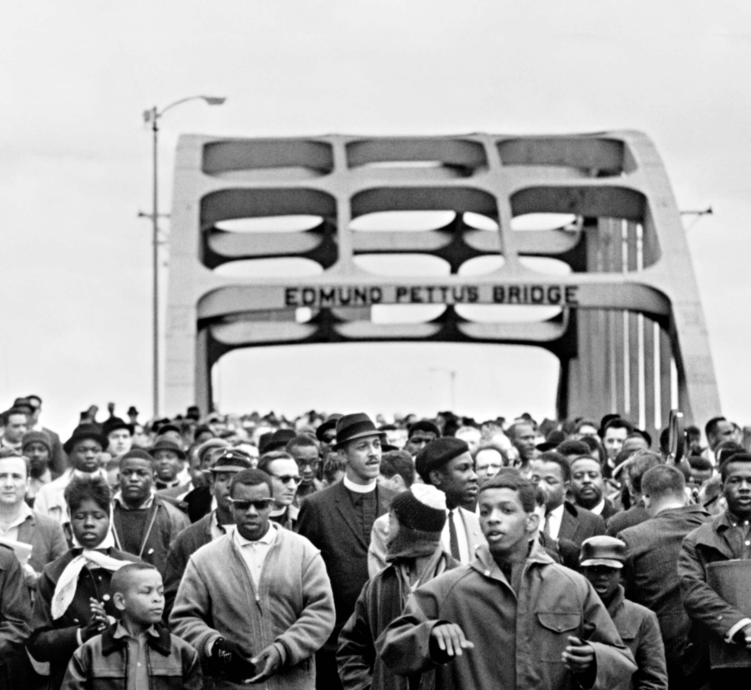 Photo of civil rights marchers at the Edmund Pettus Bridge in 1965