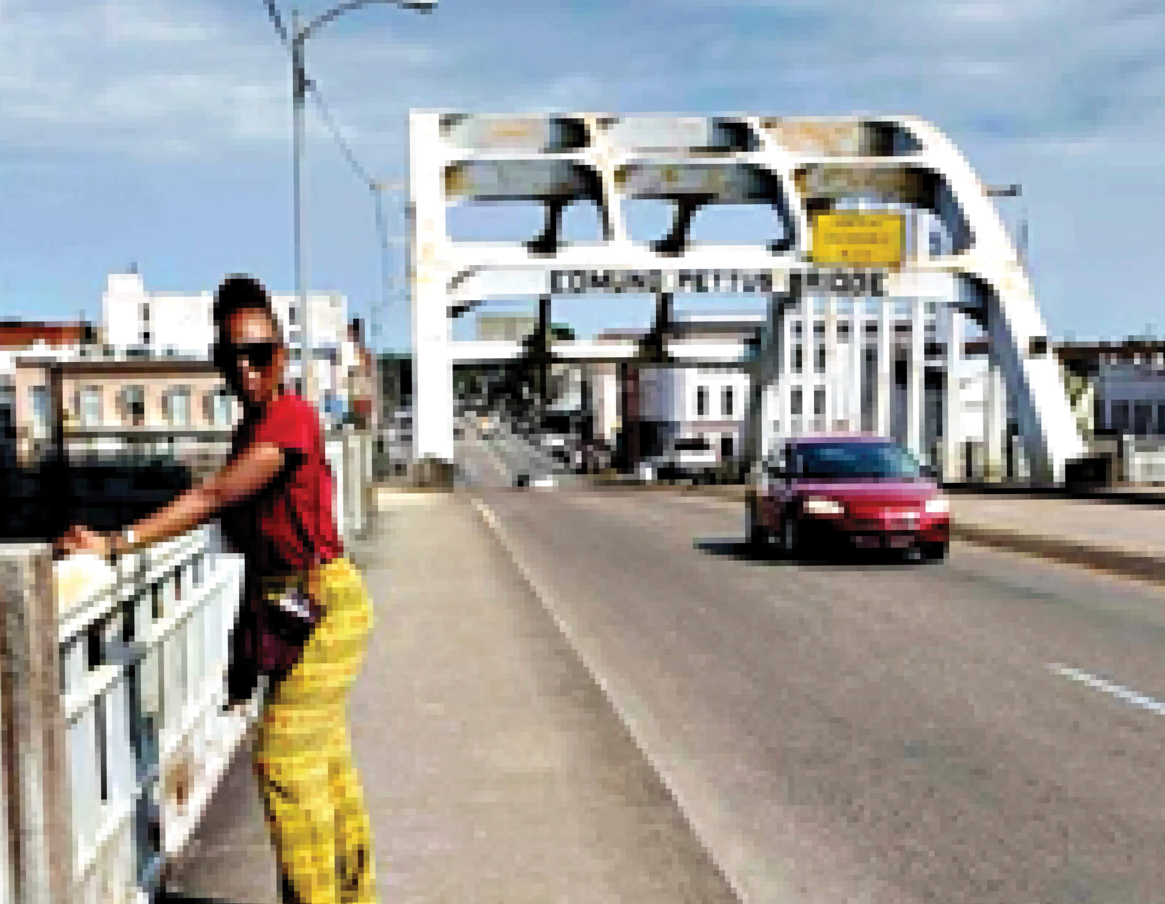 Photo of Denise Davidson with the Edmund Pettis Bridge in the background