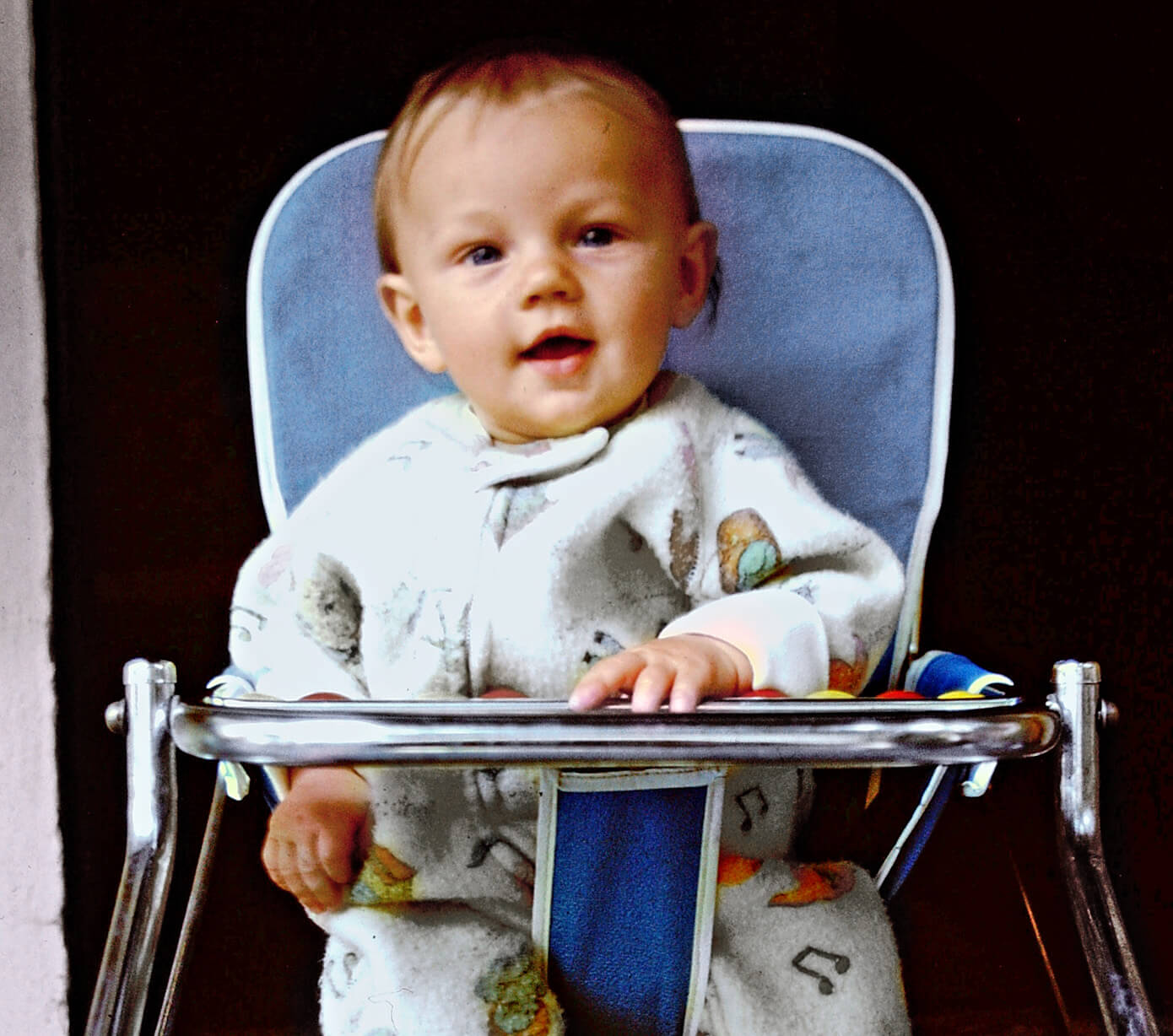 Photo of Leonardo DiCaprio as a baby sitting in a highchair