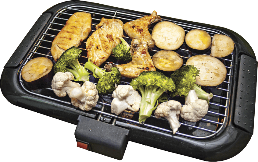 Photo of various foods cooking on an electric grill